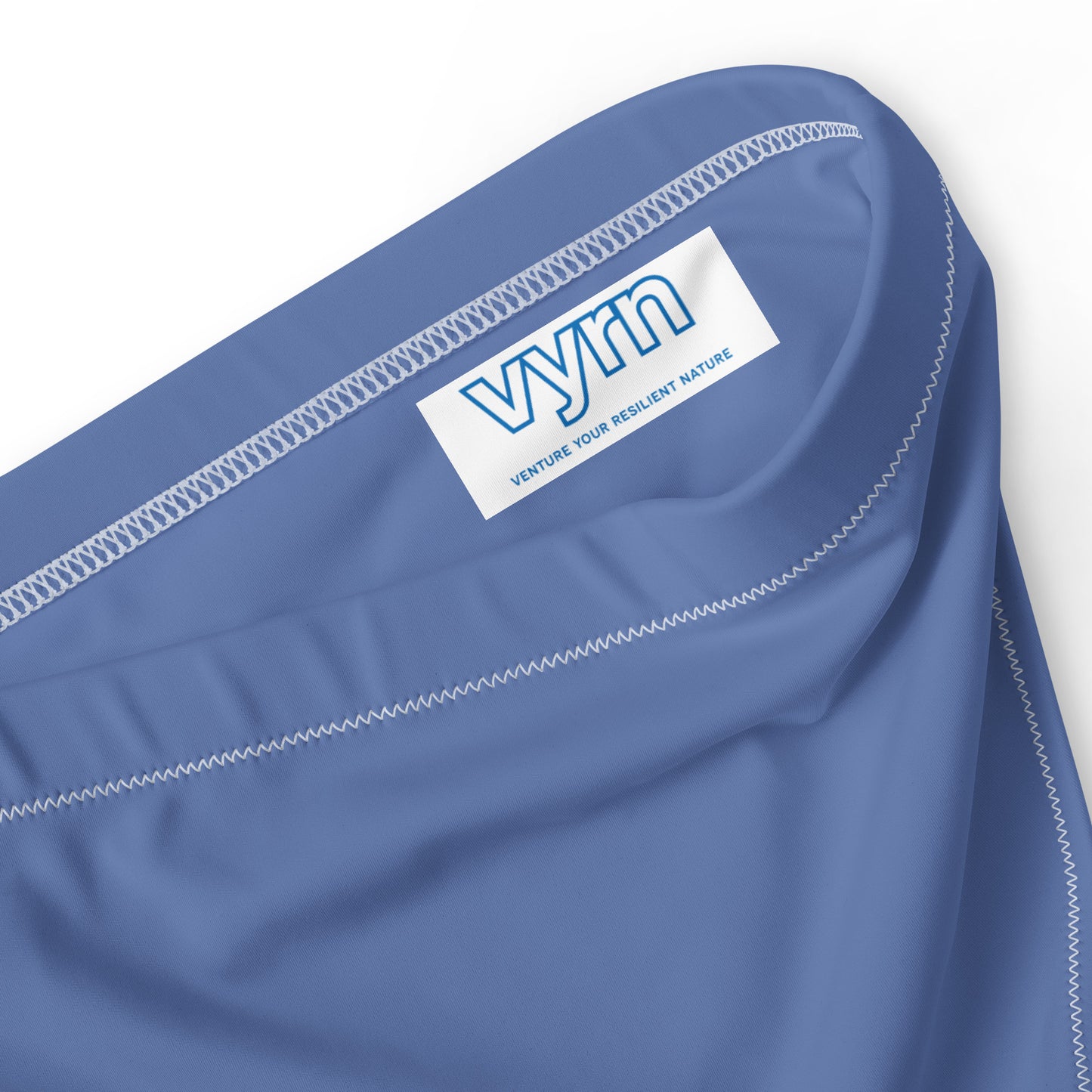 DEEP MERDIAN Close-up detail showing the secure anti-slip lining and the VYRN logo on Midnight Reef Bikini Bottom