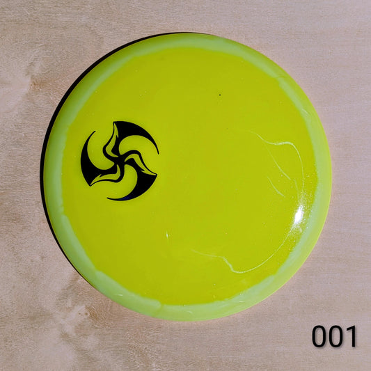 Yellow disc with a black logo on a beige background