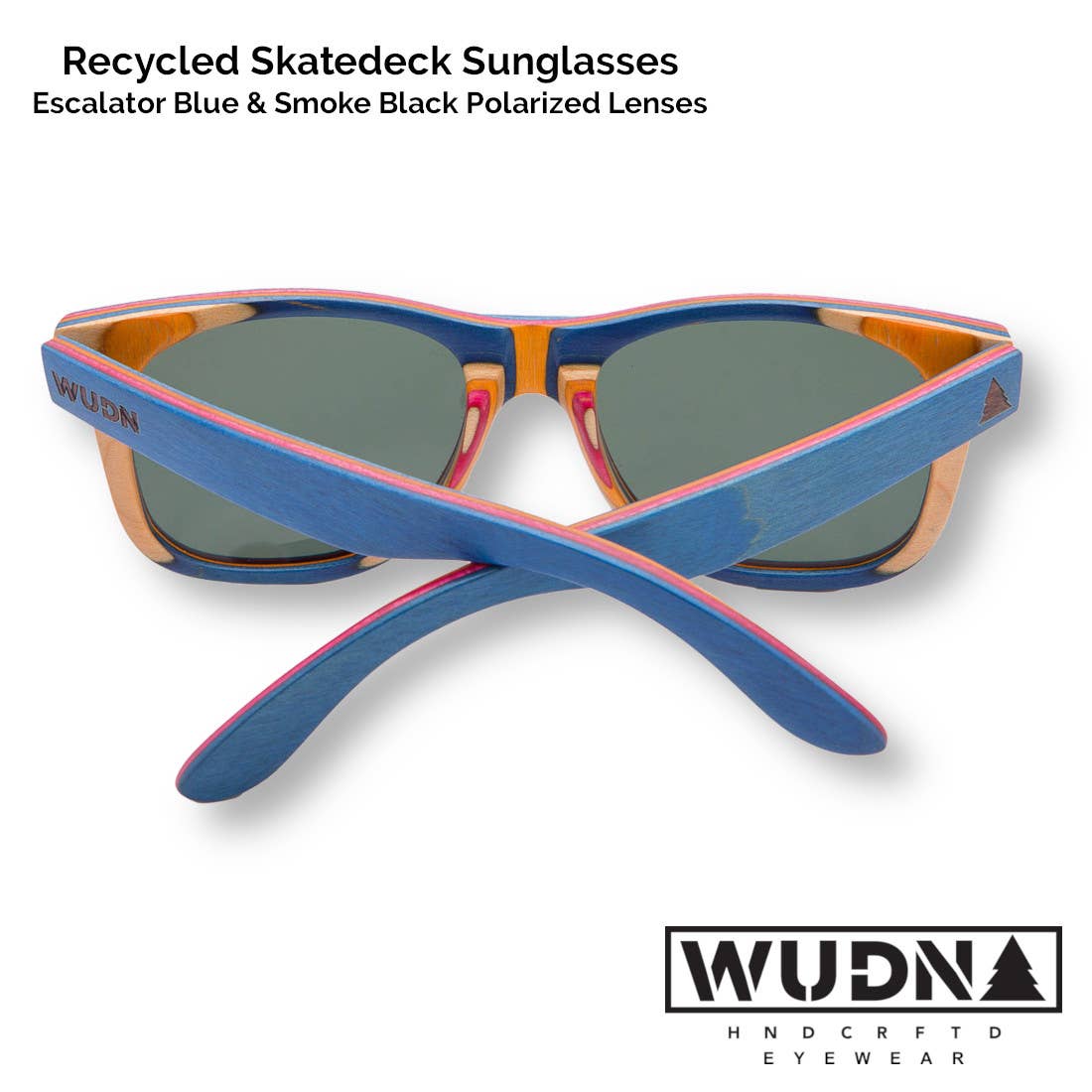 Escalator blue Recycled skatedeck sunglasses with blue and orange frame and green lenses on a white background, featuring WUDN logo.