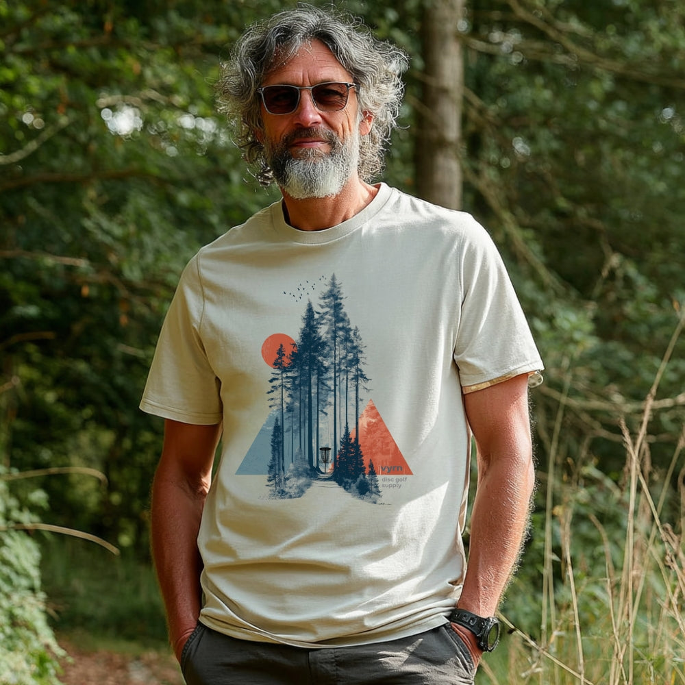 desert dust Model wearing The Forest Glide Tee, a premium 100% organic cotton sustainable tee by VYRN