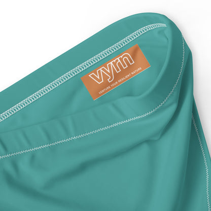 VIBRANT AZURE Close-up detail showing the secure anti-slip lining and the VYRN logo on Ember Tide Bikini Bottom