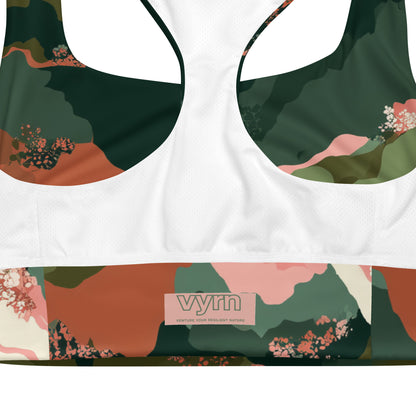 Olive Bloom  sports bra with floral pattern and 'vyrn' brand logo on a white background