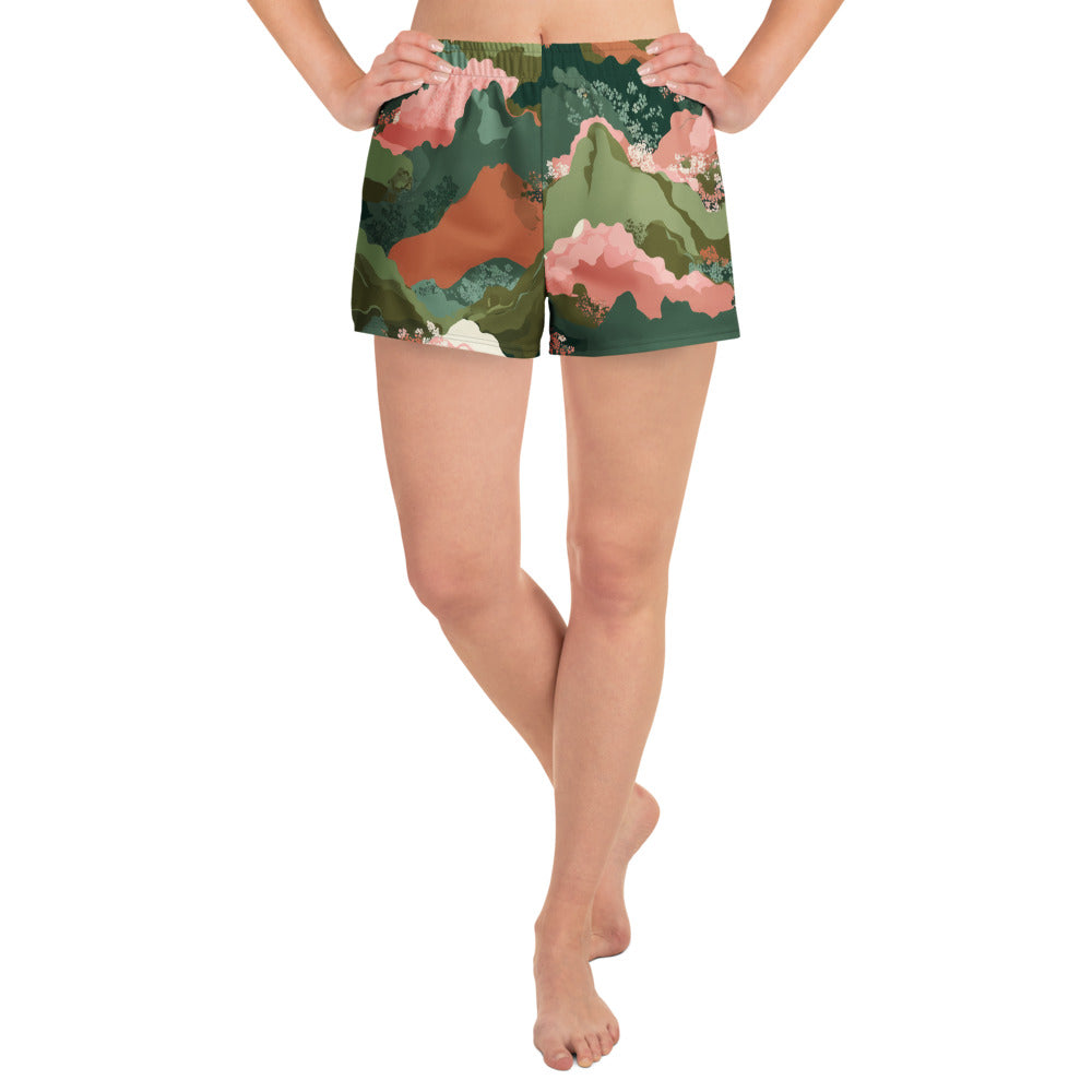 Olive Bloom Person wearing a pair of floral shorts on a white background