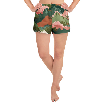 Olive Bloom Person wearing a pair of floral shorts on a white background