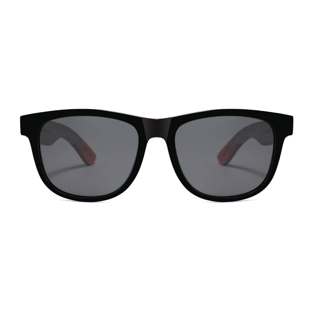 ollie Black sunglasses with dark lenses on a white background