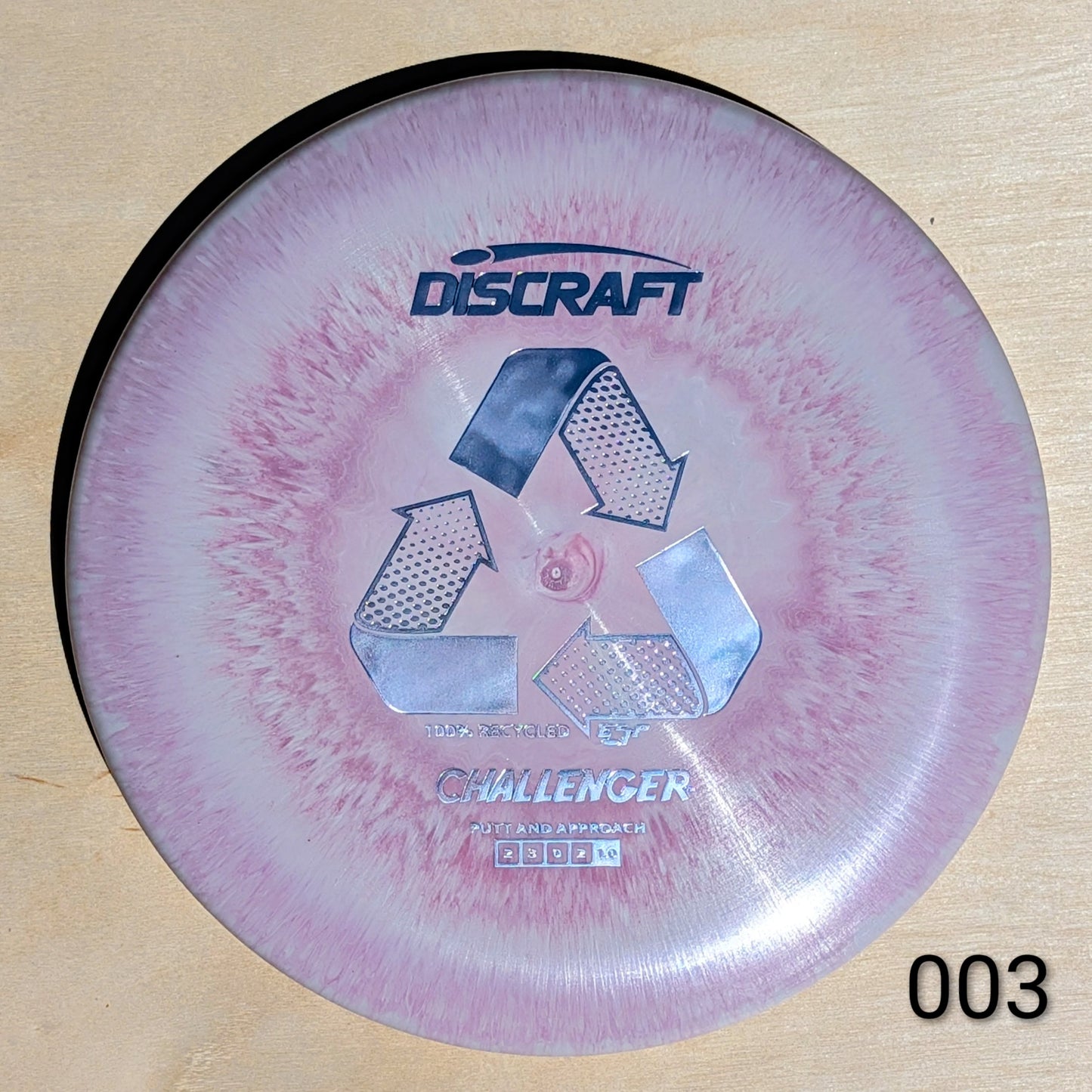 Discraft Challenger disc golf disc on a wooden surface