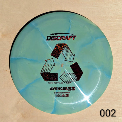Discraft Avenger SS disc golf disc on a cardboard background