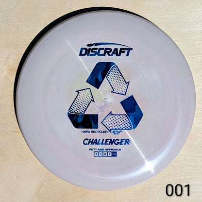 Discraft Challenger putter disc on a wooden surface