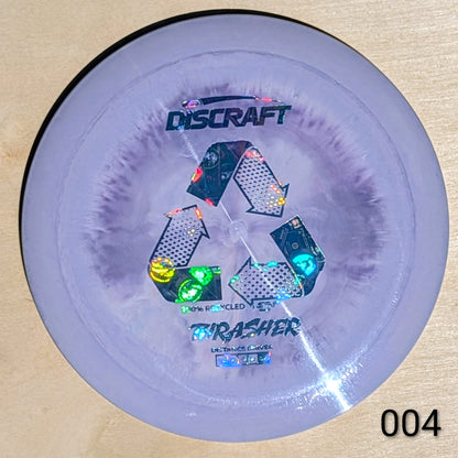 Discraft Thrasher disc golf disc on a beige background