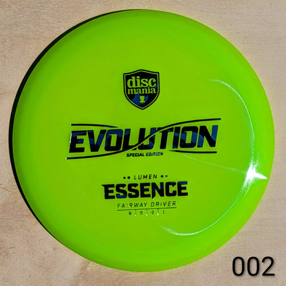 Green disc with 'Discmania' branding and text on a beige background