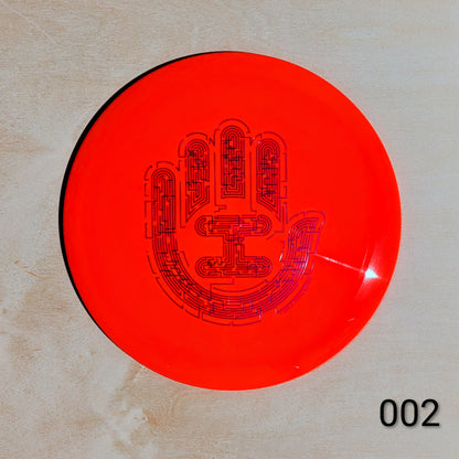 Red disc with black text and design on a beige background