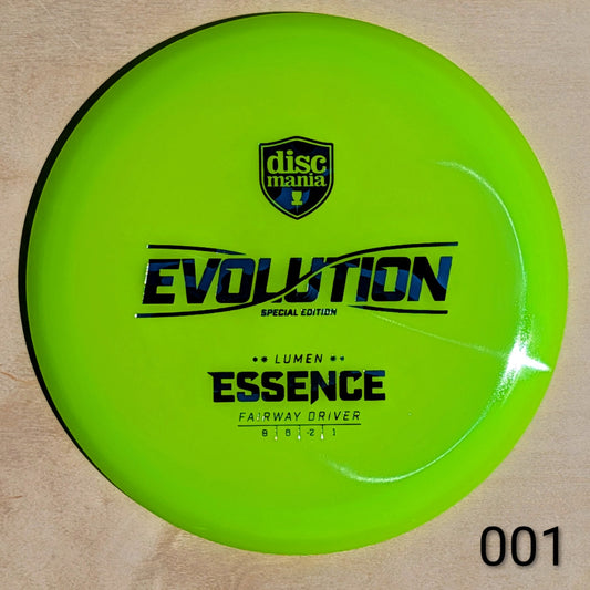 Green disc with 'Discmania' branding and 'Evolution' text on a beige background