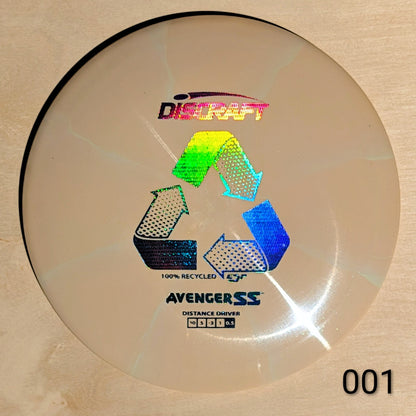Discraft Avenger SS disc golf disc on a beige background