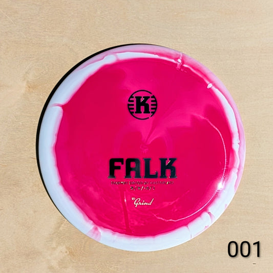 Pink and white disc with 'K' logo and text on a beige background