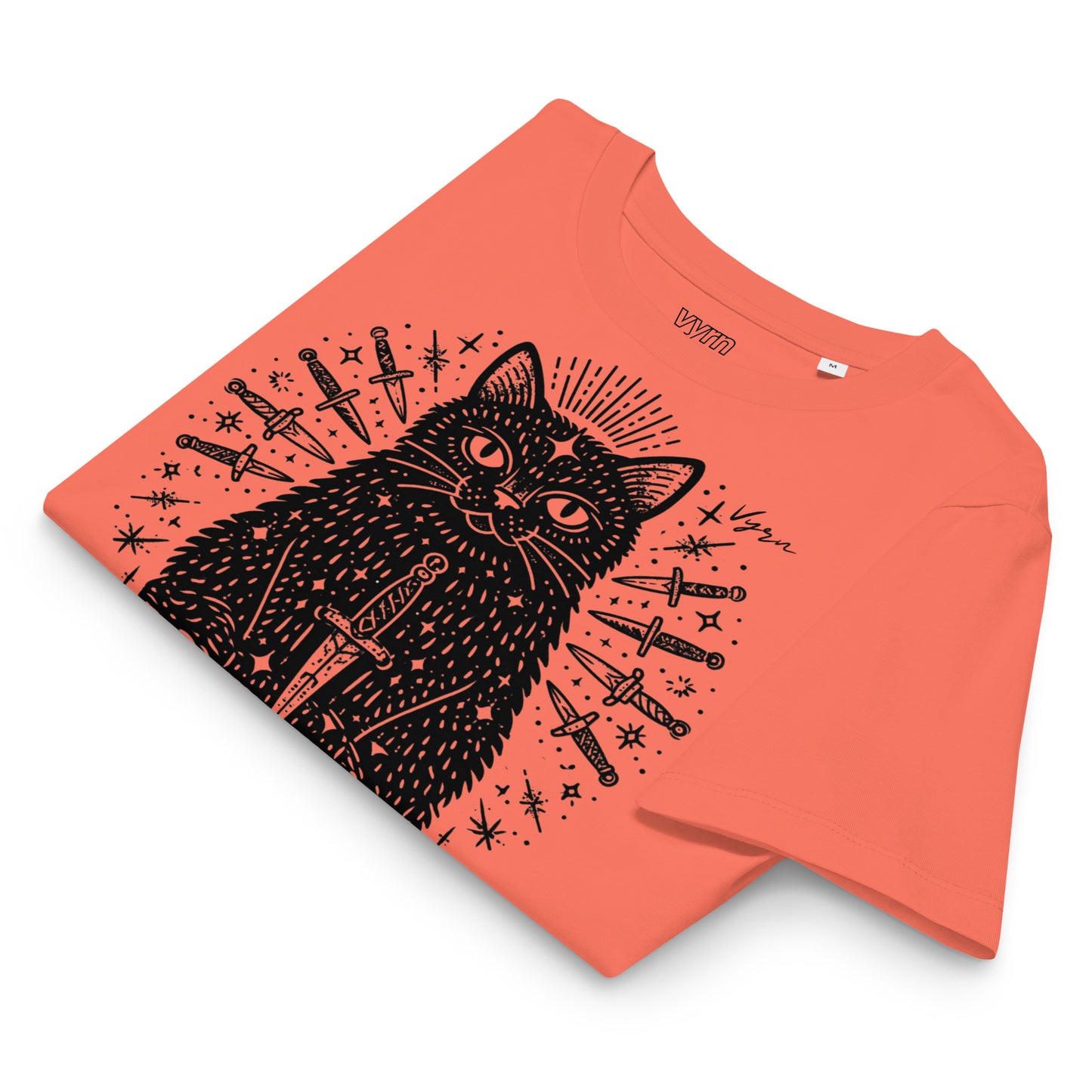 fiesta  coral orange short-sleeve t-shirt with a black graphic print of a cat surrounded by knives and stars, displayed on a clean white background.